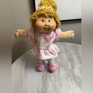 Cabbage patch kids dark blonde girl in full vintage CPK clothes and boots